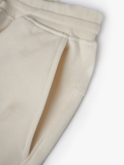 Quần Jogger Thun Rã Phối Form Regular JO014 Màu Kem