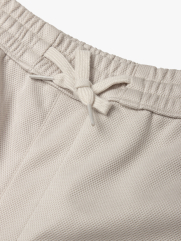 Quần Short Thun Tổ Ong Gắn Tag Silicon Form Regular QS071 Màu Be