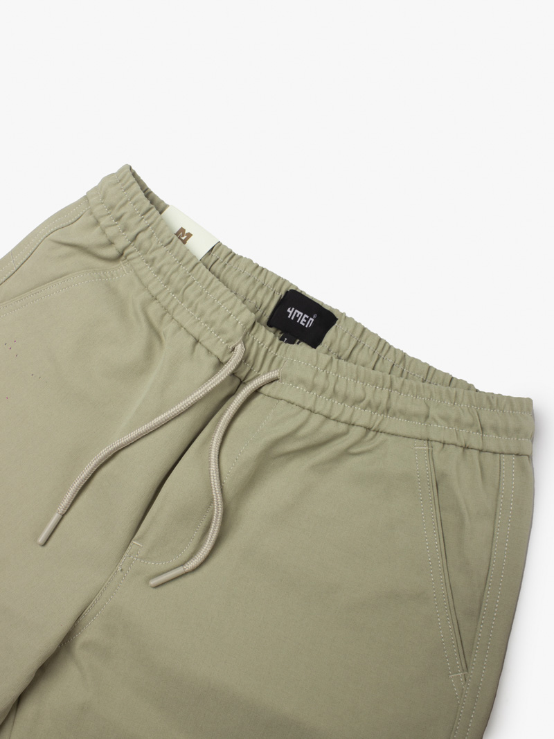 Quần Short Kaki Lưng Thun Gắn Nhãn Trang Trí Form Straight QS067 Màu Be Nhạt