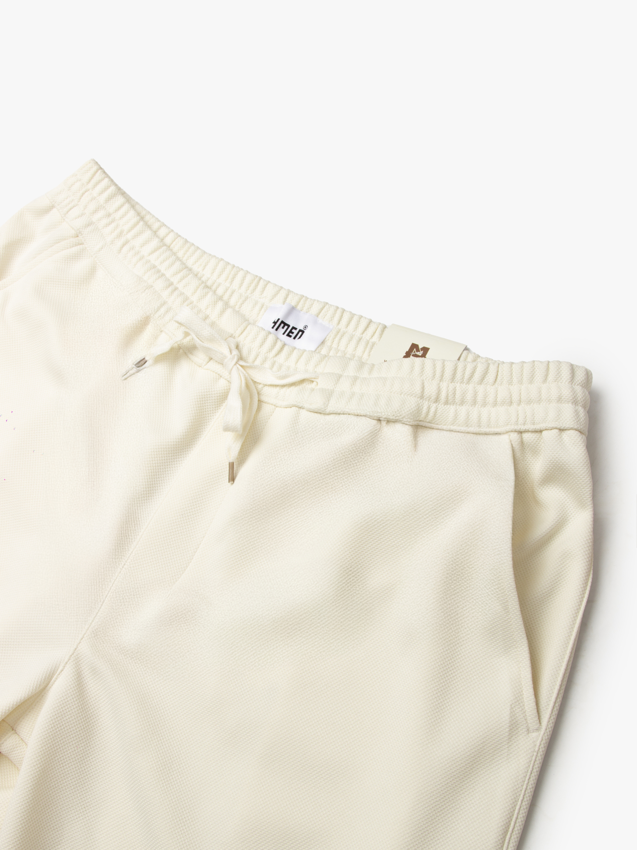 Quần Short Thun Tổ Ong Gắn Tag Silicon Form Regular QS071 Màu Trắng Kem